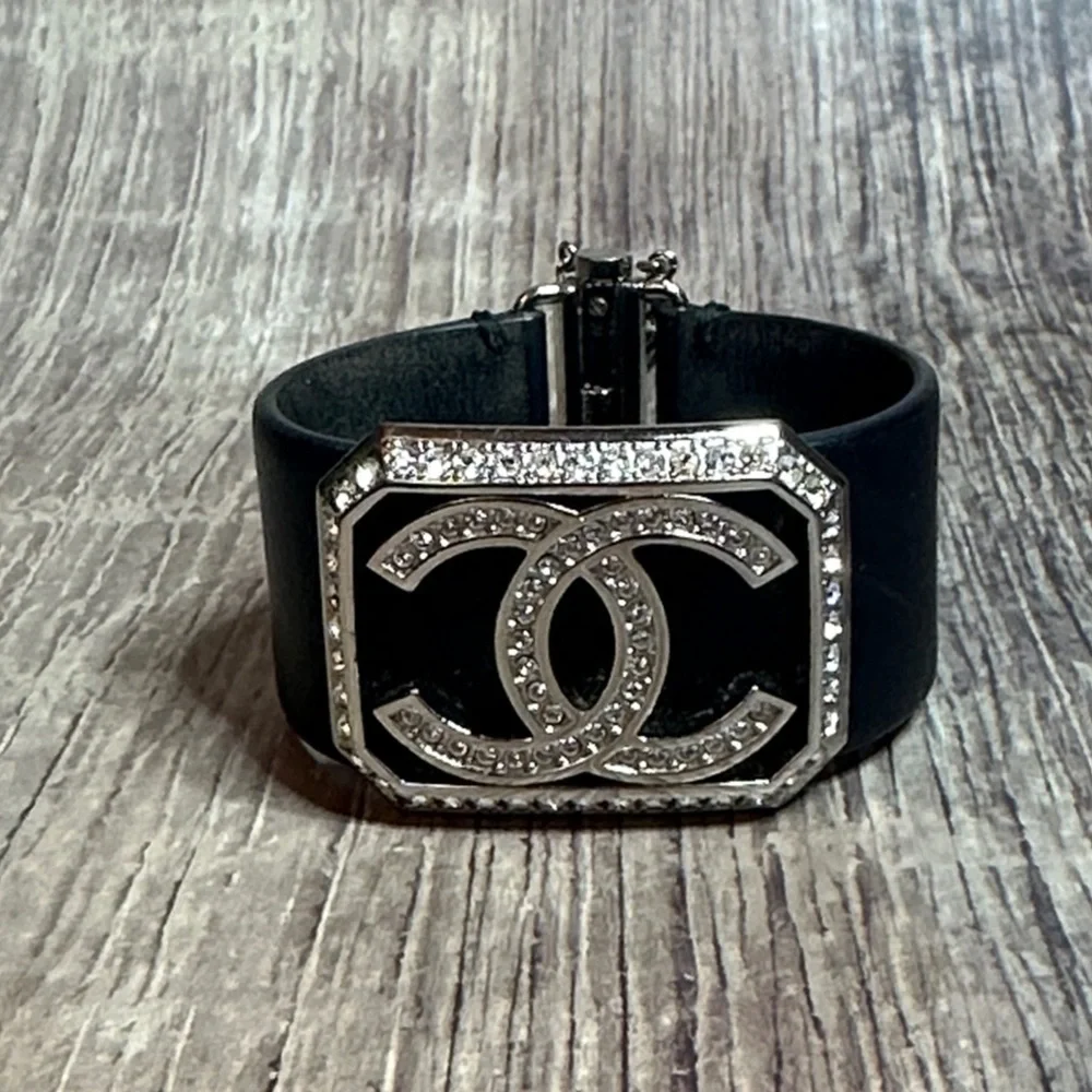 Stunning CHANEL Authentic Crystal Logo Bracelet with Leather Band.